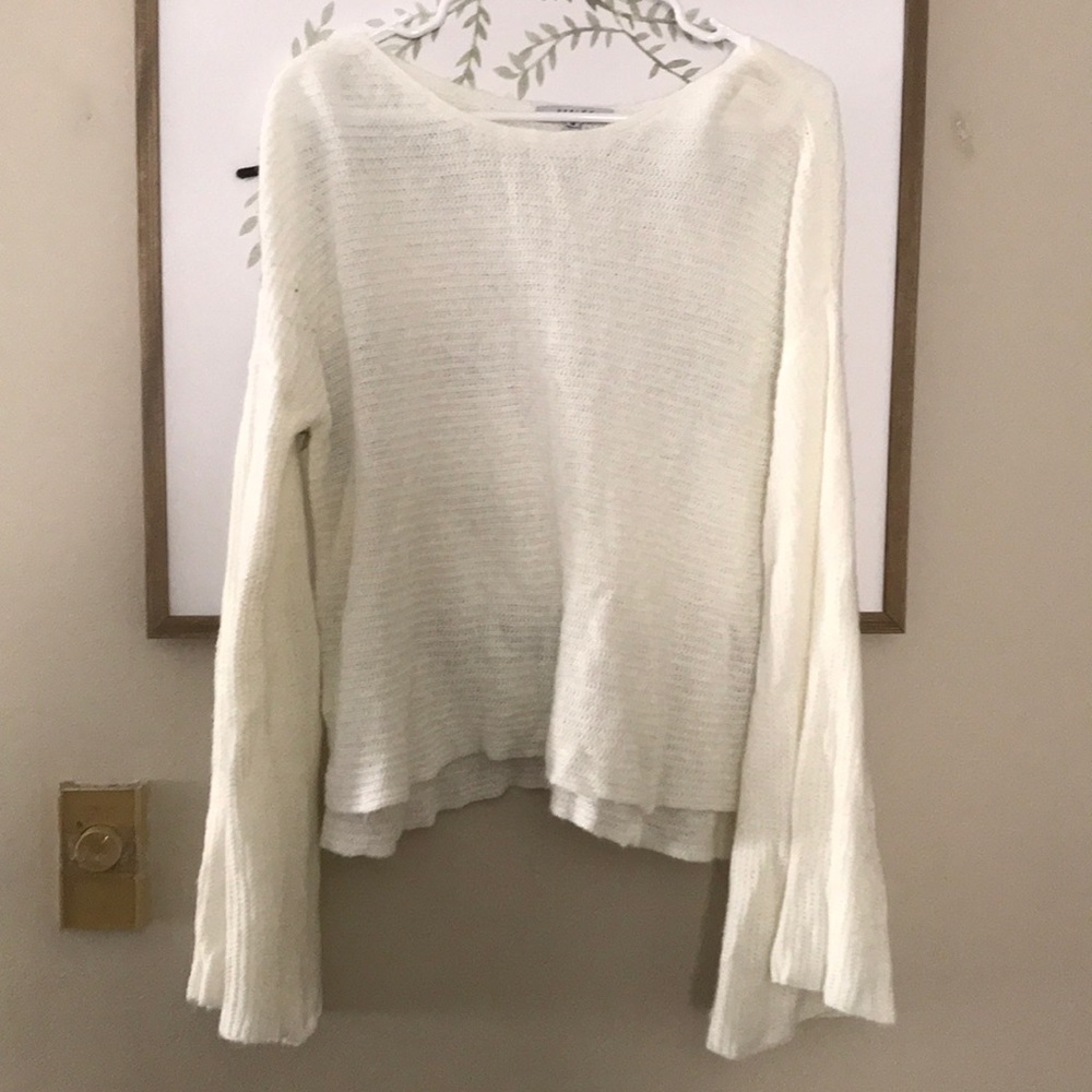 Scoopneck cream sweater with bell sleeves